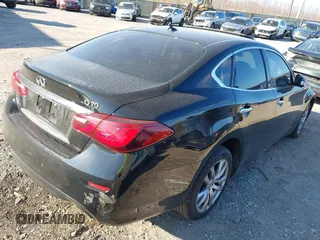 2015 Infiniti Q70 with VIN JN1BY1AR6FM560209, listed as a IAAI auction lot 41703926 with 117,503 mi miles and . Bid and sale history available at DreamBid. Image 4.