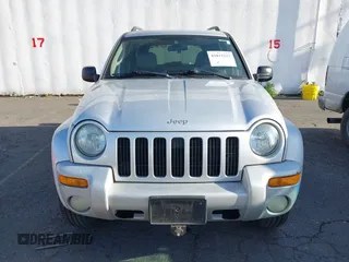 2003 Jeep Liberty Limited z VIN 1J8GL58K73W694818, wystawiony jako IAAI lot #42032227 z przebiegiem 217 446 mil mil oraz . Historia ofert i sprzedaży dostępna na DreamBid. Obrazek 12.