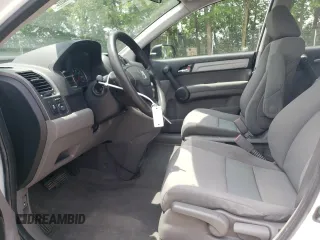 2010 Honda CR-V LX with VIN 3CZRE3H35AG705585, listed as a Copart auction lot 60032855 with 115,136 mi miles and Salvage title. Bid and sale history available at DreamBid. Image 7.
