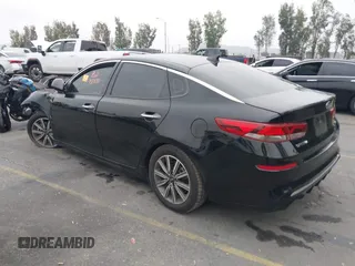 2019 Kia Optima EX with VIN 5XXGU4L14KG290842, listed as a IAAI auction lot 42030617 with Not Provided miles and . Bid and sale history available at carsss.com. Image 3.