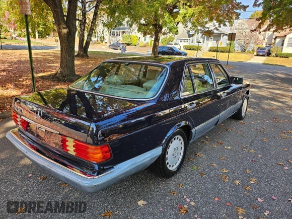 1988 Mercedes-Benz 560 with VIN WDBCA39D0JA410101, listed as a Copart auction lot 78961194 with 247,459 mi miles and Clean Title. Bid and sale history available at DreamBid. Image 4.