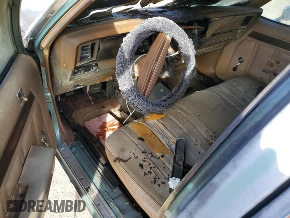 1977 Chevrolet Impala с VIN IL69U7J272968, выставлен на аукционе Copart как лот 75909154 с пробегом Не указан миль и Списание • Salvage title. История ставок и продаж доступна на DreamBid. Изображение 8.