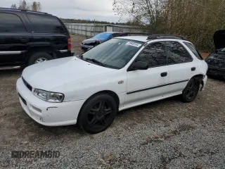 1999 Subaru Impreza L with VIN JF1GF4359XG815087, listed as a Copart auction lot 75949184 with 185,192 mi miles and Salvage title. Bid and sale history available at DreamBid. Image 1.