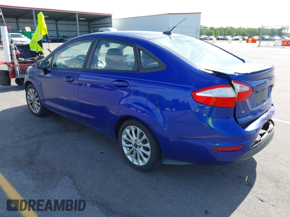 2014 Ford Fiesta SE with VIN 3FADP4BJ5EM190009, listed as a IAAI auction lot 42036976 with 157,575 mi miles. Bid and sale history available at carsss.com. Image 3.