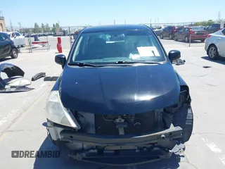 2009 Nissan Versa S z VIN 3N1BC13E09L393627, wystawiony jako IAAI lot #42301217 z przebiegiem 135 492 mil mil oraz . Historia ofert i sprzedaży dostępna na DreamBid. Obrazek 13.