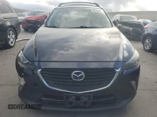 2017 Mazda CX-3 Touring z VIN JM1DKFC7XH0146277, wystawiony jako Copart lot #50199405 z przebiegiem 160 485 mil mil oraz Nie do naprawy. Historia ofert i sprzedaży dostępna na DreamBid. Obrazek 5.