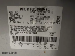 2013 Ford Edge SEL with VIN 2FMDK4JC2DBE33878, listed as a IAAI auction lot 41597848 with 216,761 mi miles. Bid and sale history available at carsss.com. Image 9.