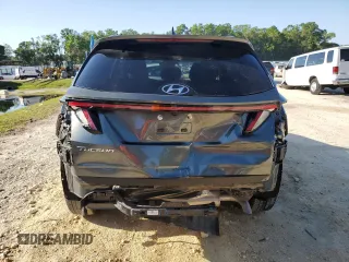 2022 Hyundai Tucson SEL with VIN 5NMJB3AE1NH121735, listed as a Copart auction lot 52225955 with 43,952 mi miles and Salvage Title. Bid and sale history available at carsss.com. Image 6.