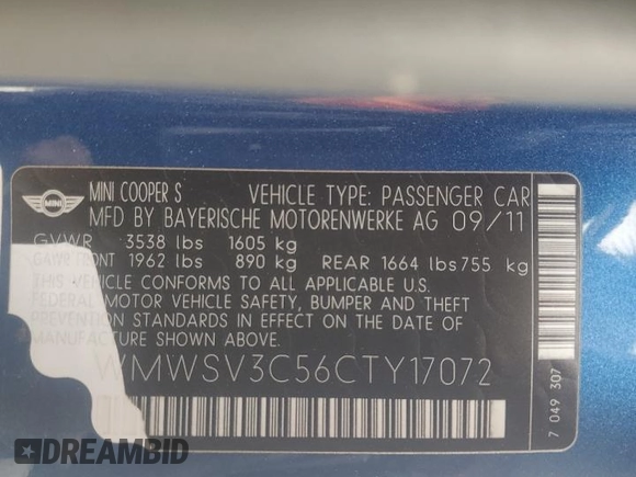 2012 MINI Hardtop S with VIN WMWSV3C56CTY17072, listed as a Copart auction lot 58275165 with 101,542 mi miles and Salvage title. Bid and sale history available at DreamBid. Image 12.