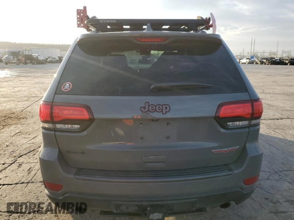 2020 Jeep Grand Cherokee Trailhawk with VIN 1C4RJFLT9LC430514, listed as a Copart auction lot 85311924 with 170,554 mi miles and Salvage title. Bid and sale history available at DreamBid. Image 6.