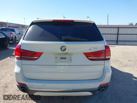 2014 BMW X5 sDrive35i with VIN 5UXKR2C53E0C01692, listed as a IAAI auction lot 41727216 with 135,985 mi miles. Bid and sale history available at carsss.com. Image 16.