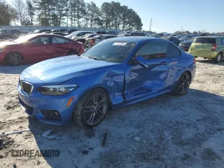 2018 BMW 2 Series 230i with VIN WBA2J1C57JVD09746, listed as a Copart auction lot 77737893 with 61,801 mi miles. Bid and sale history available at carsss.com. Image 1.