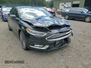 2017 Ford Fusion SE z VIN 3FA6P0H96HR150012, wystawiony jako Copart lot #56789925 z przebiegiem 167 772 mil mil oraz Szkoda całkowita • Salvage title. Historia ofert i sprzedaży dostępna na DreamBid. Obrazek 13.