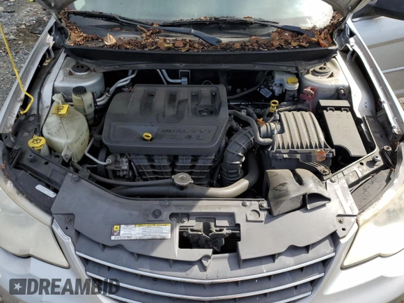 2010 Chrysler Sebring Touring with VIN 1C3CC4FBXAN191004, listed as a Copart auction lot 70193354 with 0 mi miles and Salvage Title. Bid and sale history available at carsss.com. Image 11.