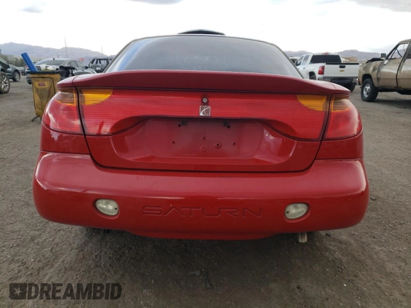 2001 Saturn SC z VIN 1G8ZY12701Z201761, wystawiony jako Copart lot #76792804 z przebiegiem 85 352 mil mil oraz Szkody całkowita. Historia ofert i sprzedaży dostępna na DreamBid. Obrazek 6.