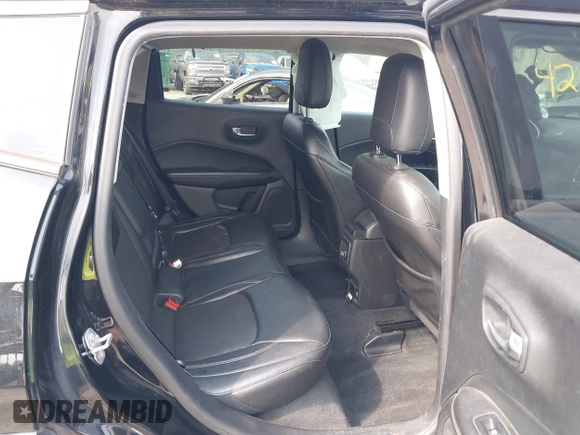 2018 Jeep Compass Latitude with VIN 3C4NJDBB2JT114644, listed as a IAAI auction lot 42499210 with 82,988 mi miles and . Bid and sale history available at DreamBid. Image 8.