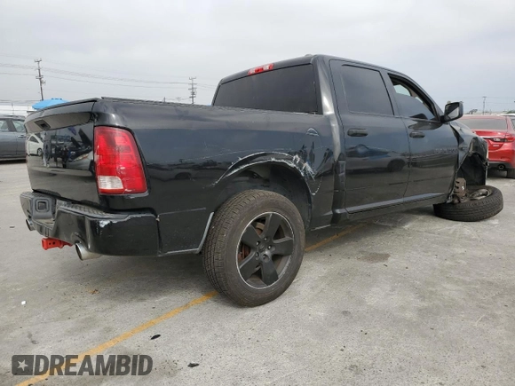 2012 Ram 1500 Express with VIN 1C6RD6KT4CS156807, listed as a Copart auction lot 62300235 with 176,960 mi miles and Salvage title. Bid and sale history available at DreamBid. Image 3.