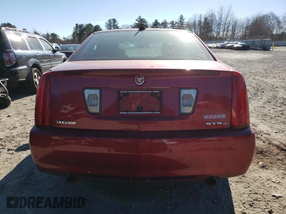 2009 Cadillac STS AWD z VIN 1G6DD67VX90138316, wystawiony jako Copart lot #80915524 z przebiegiem 112 290 mil mil oraz Czysty tytuł • Clean title. Historia ofert i sprzedaży dostępna na DreamBid. Obrazek 6.