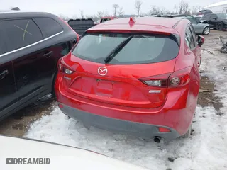 2016 Mazda Mazda3 i Grand Touring with VIN 3MZBM1N77GM245567, listed as a IAAI auction lot 41330883 with 128,423 mi miles. Bid and sale history available at carsss.com. Image 16.