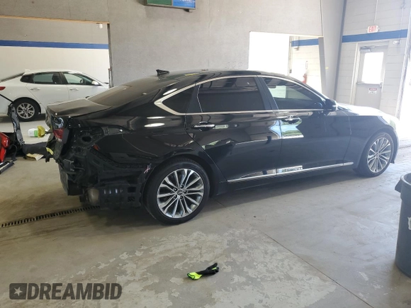 2017 Genesis G80 3.8L z VIN KMHGN4JE7HU206515, wystawiony jako Copart lot #57493675 z przebiegiem 115 108 mil mil oraz Szkoda całkowita • Salvage title. Historia ofert i sprzedaży dostępna na DreamBid. Obrazek 3.
