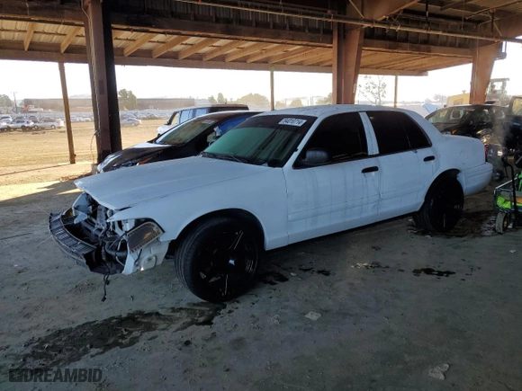 2005 Ford Police Interceptor with VIN 2FAFP71W85X105918, listed as a Copart auction lot 84010714 with 136,839 mi miles and Salvage Title. Bid and sale history available at carsss.com. Image 1.
