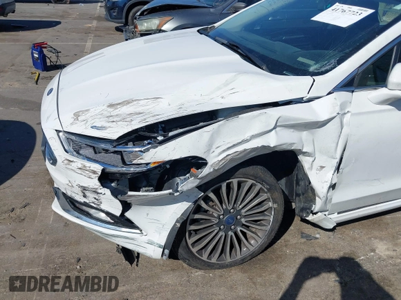 2018 Ford Fusion Titanium with VIN 3FA6P0D93JR162212, listed as a IAAI auction lot 41767723 with 134,010 mi miles and . Bid and sale history available at DreamBid. Image 6.