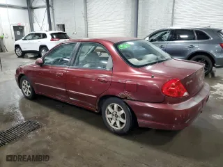 2003 Kia Spectra with VIN KNAFB121735217341, listed as a Copart auction lot 72016504 with 116,224 mi miles and Salvage Title. Bid and sale history available at carsss.com. Image 2.
