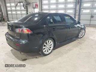 2011 Mitsubishi Lancer GTS with VIN JA32U8FW7BU034390, listed as a IAAI auction lot 41643536 with 130,319 mi miles and . Bid and sale history available at carsss.com. Image 4.
