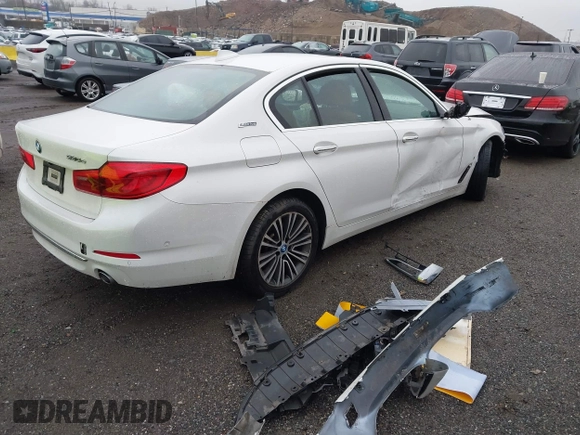 2018 BMW 5 Series 530e xDrive with VIN WBAJB1C50JG624043, listed as a IAAI auction lot 41814687 with 41,301 mi miles and . Bid and sale history available at DreamBid. Image 4.