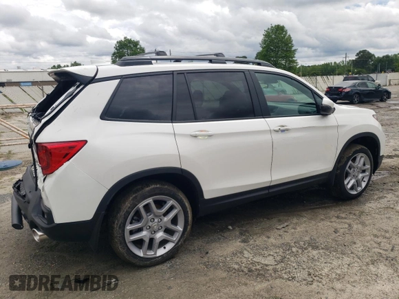 2024 Honda Passport EX-L z VIN 5FNYF8H50RB023552, wystawiony jako Copart lot #58101325 z przebiegiem 573 mil mil oraz Tytuł czysty. Historia ofert i sprzedaży dostępna na DreamBid. Obrazek 3.