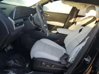2024 Cadillac XT4 FWD Sport with VIN 1GYFZER47RF101186, listed as a Copart auction lot 79128454 with 10,499 mi miles and Salvage title. Bid and sale history available at DreamBid. Image 7.