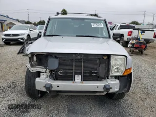2010 Jeep Commander Sport with VIN 1J4RG4GK2AC121821, listed as a Copart auction lot 57793545 with 171,405 mi miles and Salvage title. Bid and sale history available at DreamBid. Image 5.