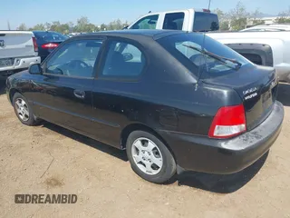 2001 Hyundai Accent GL z VIN KMHCG35C01U114597, wystawiony jako IAAI lot #42163745 z przebiegiem 203 310 mil mil oraz . Historia ofert i sprzedaży dostępna na DreamBid. Obrazek 3.