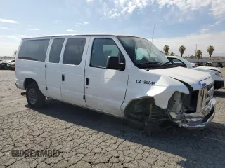2014 Ford Econoline Passenger XL with VIN 1FBNE3BLXEDA14976, listed as a Copart auction lot 65948404 with 285,655 mi miles and Salvage Title. Bid and sale history available at DreamBid. Image 4.