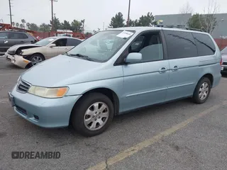 2003 Honda Odyssey EX-L with VIN 5FNRL18943B138444, listed as a IAAI auction lot 41498605 with 153,947 mi miles and . Bid and sale history available at DreamBid. Image 18.