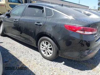 2017 Kia Optima LX z VIN KNAGT4L33H5156094, wystawiony jako IAAI lot #42405505 z przebiegiem 111 622 mil mil oraz . Historia ofert i sprzedaży dostępna na DreamBid. Obrazek 3.