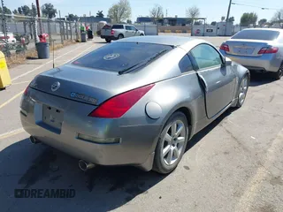 2005 Nissan 350Z 35th Anniversary Edition z VIN JN1AZ34D15M608766, wystawiony jako IAAI lot #41852248 z przebiegiem 261 809 mil mil oraz . Historia ofert i sprzedaży dostępna na DreamBid. Obrazek 4.