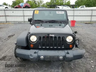 2012 Jeep Wrangler Unlimited Sport z VIN 1C4BJWDG9CL102626, wystawiony jako Copart lot #58421455 z przebiegiem 128 421 mil mil oraz Szkoda całkowita • Salvage title. Historia ofert i sprzedaży dostępna na DreamBid. Obrazek 5.