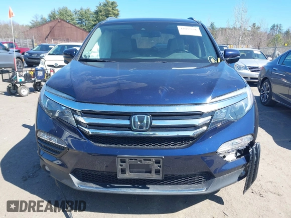 2017 Honda Pilot Touring with VIN 5FNYF6H98HB020341, listed as a IAAI auction lot 42037156 with 73,511 mi miles and . Bid and sale history available at DreamBid. Image 12.