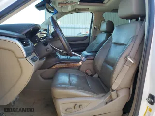 2015 Chevrolet Tahoe LTZ with VIN 1GNSKCKC9FR666040, listed as a Copart auction lot 44431875 with 233,166 mi miles and Salvage Title. Bid and sale history available at carsss.com. Image 7.