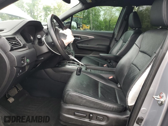 2019 Honda Passport EX-L with VIN 5FNYF8H52KB030914, listed as a Copart auction lot 55708015 with 103,784 mi miles and Salvage title. Bid and sale history available at DreamBid. Image 7.