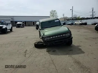 2023 Ford Bronco z VIN 1FMEE5DP2PLB22598, wystawiony jako Copart lot #54707415 z przebiegiem 10 266 mil mil oraz Szkoda całkowita • Salvage title. Historia ofert i sprzedaży dostępna na DreamBid. Obrazek 14.