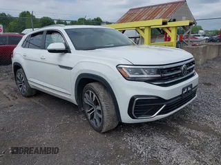 2021 Volkswagen Atlas SEL with VIN 1V2SE2CA7MC214805, listed as a IAAI auction lot 42374591 with 61,775 mi miles and . Bid and sale history available at DreamBid. Image 1.