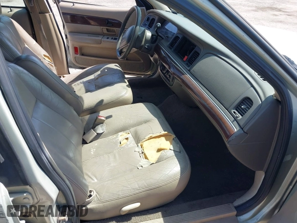 2004 Mercury Grand Marquis GS with VIN 2MEFM74W14X632470, listed as a IAAI auction lot 42120233 with 292,357 mi miles and . Bid and sale history available at DreamBid. Image 5.