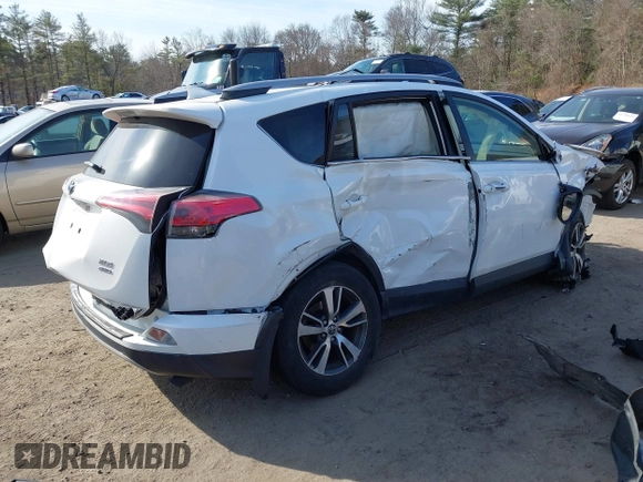 2018 Toyota RAV4 XLE with VIN JTMRFREV1JJ259705, listed as a IAAI auction lot 41779233 with 73,099 mi miles. Bid and sale history available at carsss.com. Image 4.