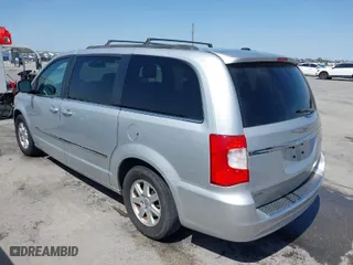 2012 Chrysler Town & Country Touring with VIN 2C4RC1BG1CR312806, listed as a IAAI auction lot 41861636 with 215,039 mi miles. Bid and sale history available at carsss.com. Image 3.