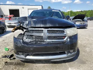 2012 Dodge Durango Crew with VIN 1C4RDHDG3CC265631, listed as a Copart auction lot 53474095 with 187,745 mi miles and Salvage Title. Bid and sale history available at DreamBid. Image 5.