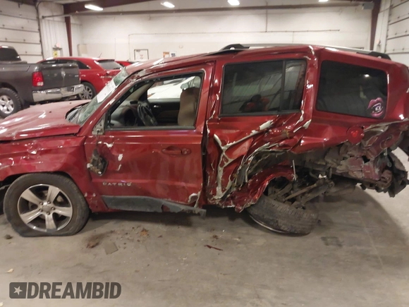 2016 Jeep Patriot Latitude with VIN 1C4NJRFB3GD707032, listed as a IAAI auction lot 41562511 with 69,693 mi miles and . Bid and sale history available at DreamBid. Image 14.