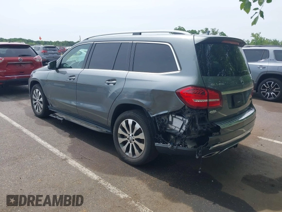2019 Mercedes-Benz GLS 450 with VIN 4JGDF6EE1KB226588, listed as a IAAI auction lot 42310009 with 116,124 mi miles and . Bid and sale history available at DreamBid. Image 3.