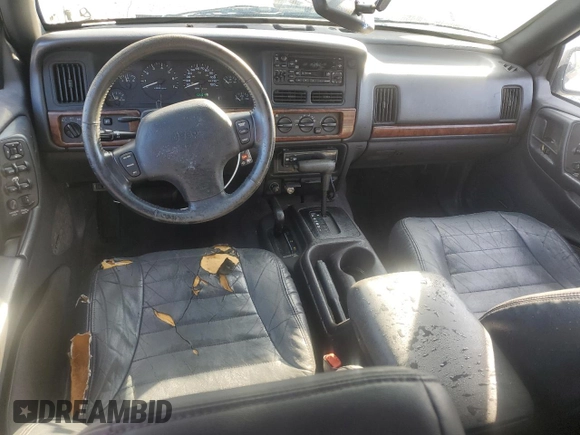 1998 Jeep Grand Cherokee Laredo with VIN 1J4GZ48Y9WC203024, listed as a Copart auction lot 83813114 with 105,044 mi miles and Non Repairable. Bid and sale history available at carsss.com. Image 8.